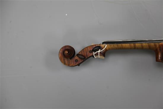 A violin with two piece back, bearing label for Petrus IO.. Mantegalia Mediolani, overall 23.5in., cased with bow